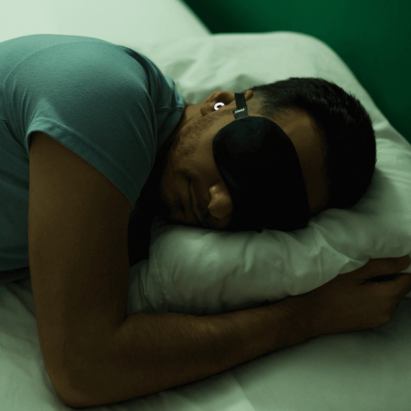 man-sleeping-with-earplugs-for-sleep