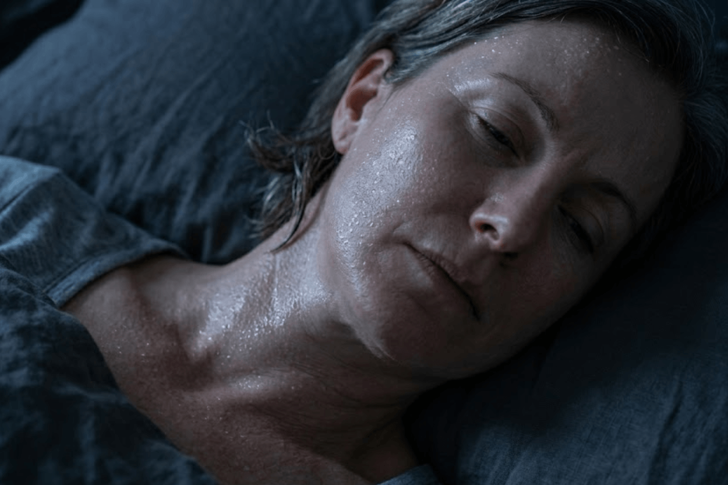 Close up of a woman showing common night sweat symptoms during perimenopause