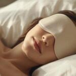 Person sleeping wearing a soft silk sleep mask