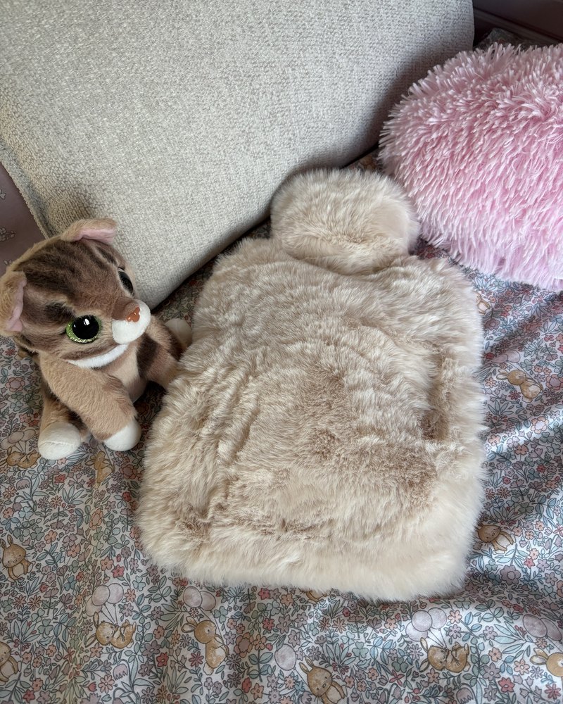 Customer photo of their Pouchy faux fur hot water bottle