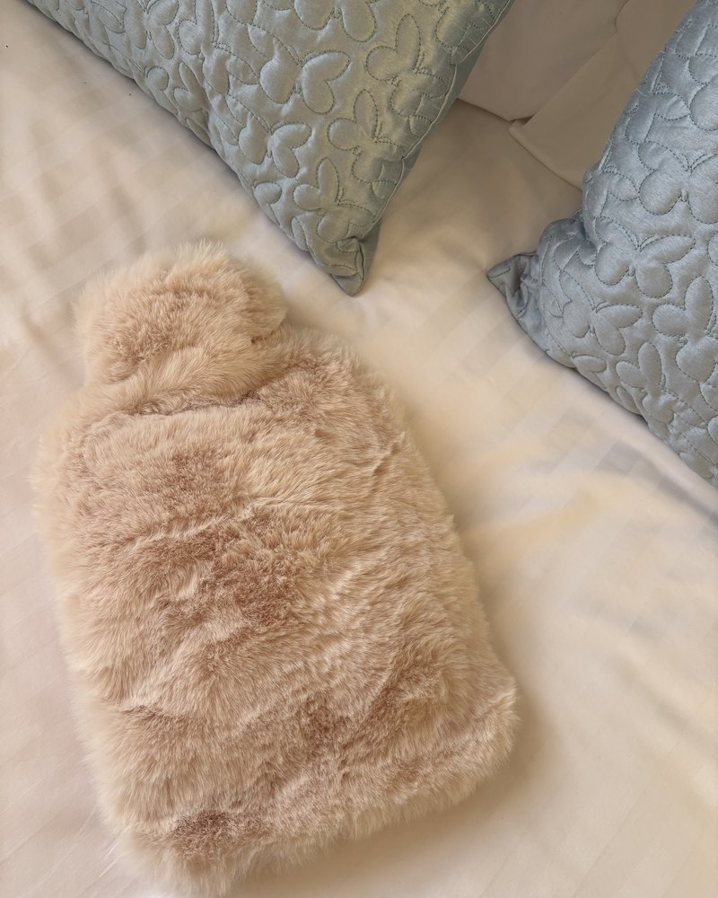Customer photo of their Pouchy faux fur hot water bottle