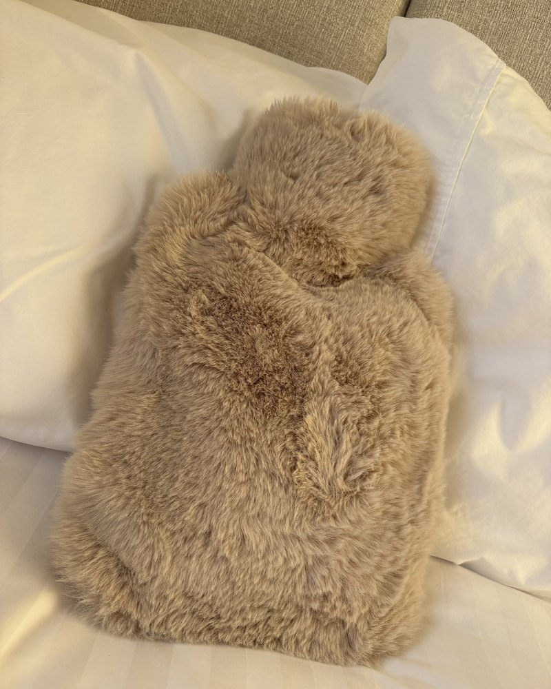 Customer photo of their Pouchy faux fur hot water bottle