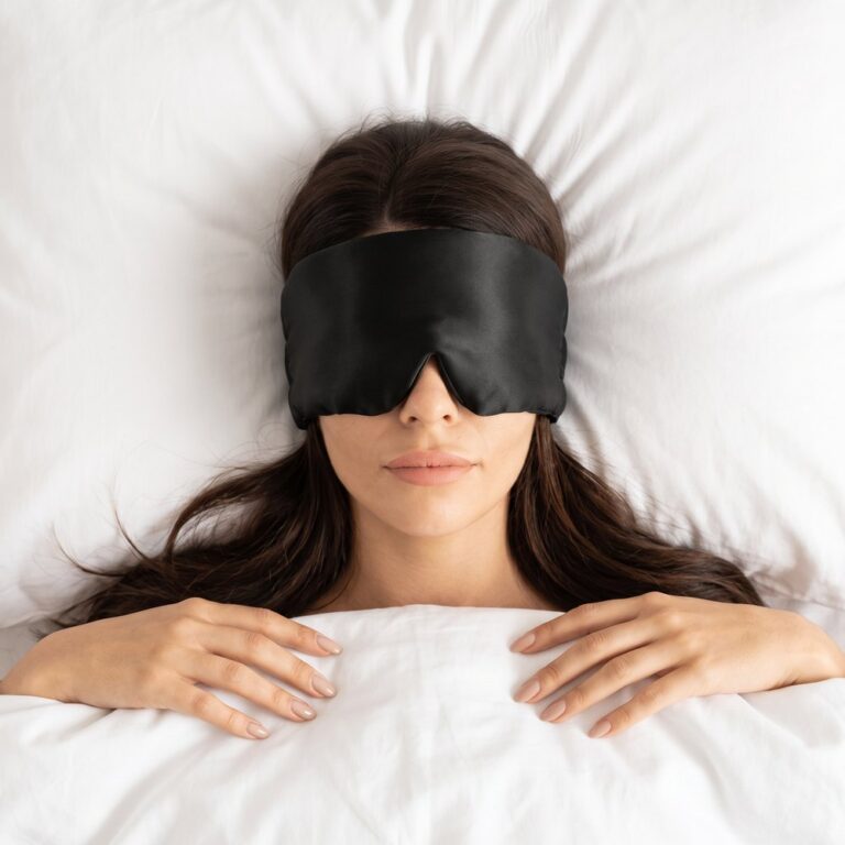 Woman asleep on her back wearing the wrap mask