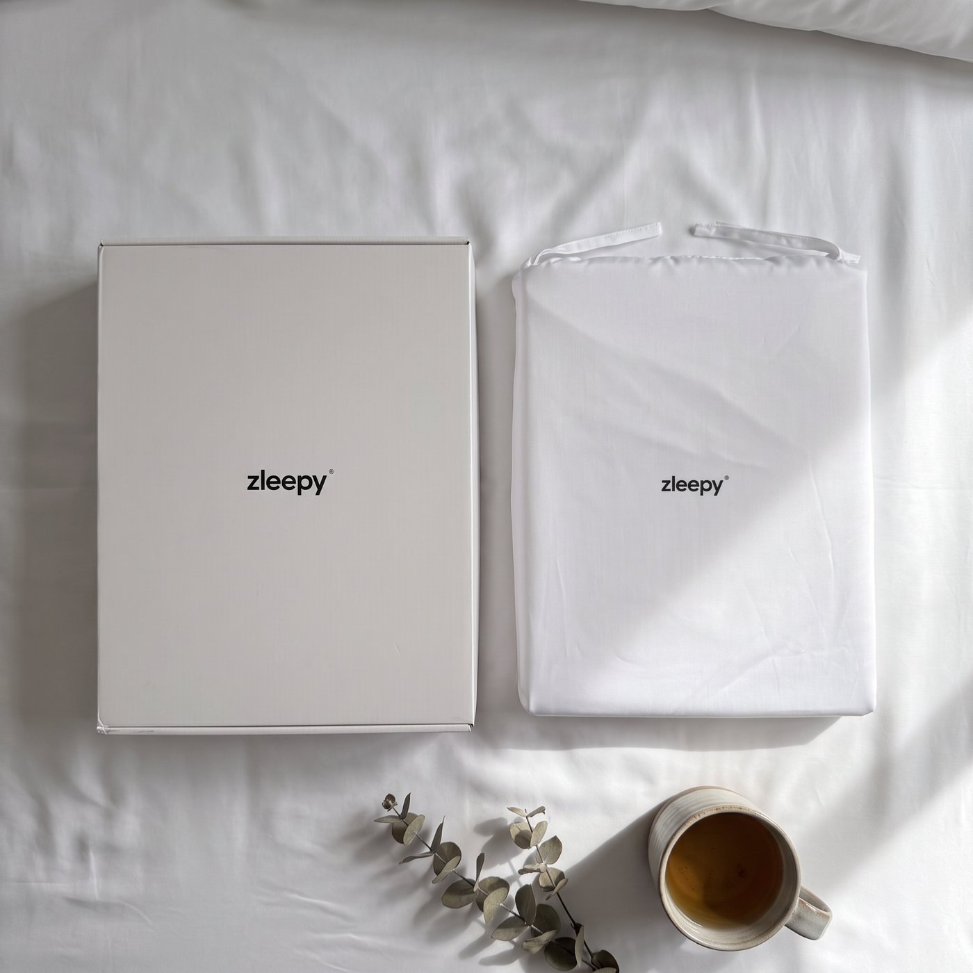ZLEEPY box and bamboo sheet bag side by side